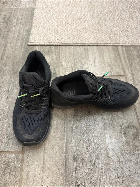Poshmark ad creative: Nike Black Athletic Running Shoes