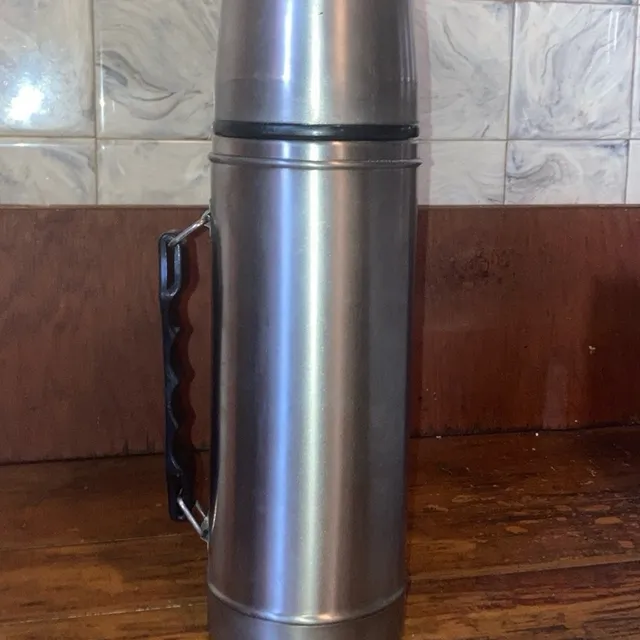 Mercari ad creative: King Thermos Stainless Vacuum Insulated Beverage Bottle Stainless Steel 40 Oz. - Home | Color: Silver
