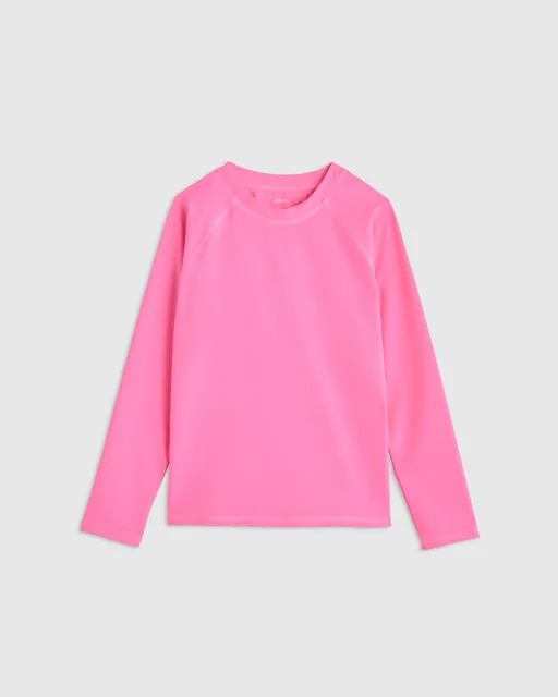 Quince ad creative: Long Sleeve Raglan Rash Guard