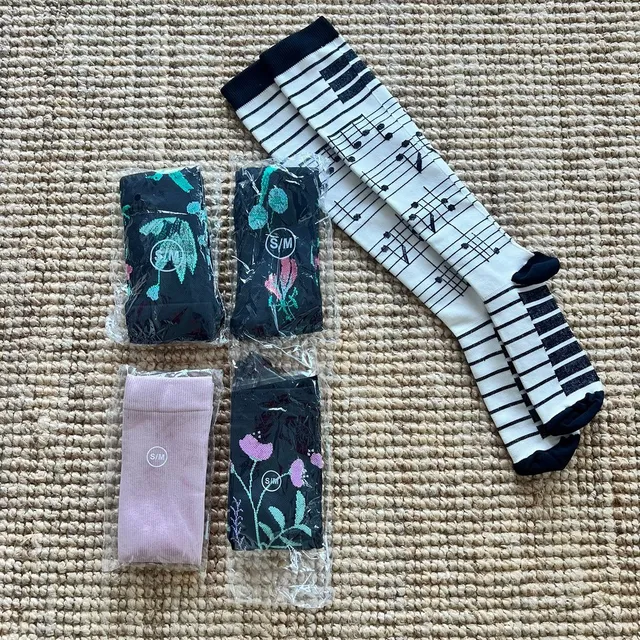 mercari.com ad creative: Amazon Socks!!! - New Women | Color: White/Gray | Size: M